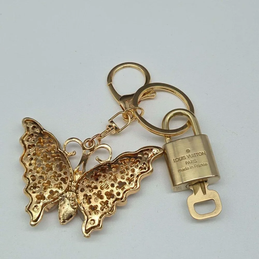 Authentic Louis Vuitton Gold Lock 🔒 Keychain Bag Unbranded Butterfly Charm LV